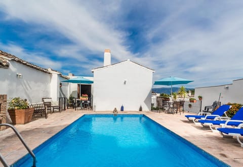 Property building, BBQ facilities, View (from property/room), Balcony/Terrace, Landmark view, Mountain view, Pool view, Swimming pool