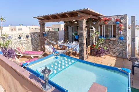 Property building, Living room, Swimming pool