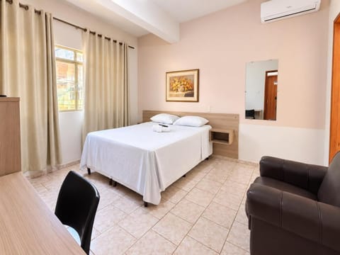 Bed, Photo of the whole room, Bedroom, towels, air conditioner
