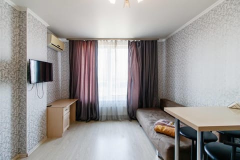 Bed, TV and multimedia, Living room, Seating area, Bedroom, locker, locker, air conditioner