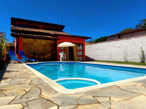 Property building, Day, Pool view, Swimming pool, Swimming pool, sunbed