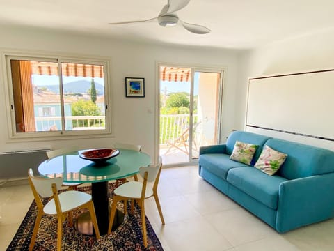 View (from property/room), Living room, Seating area, Dining area, fireplace