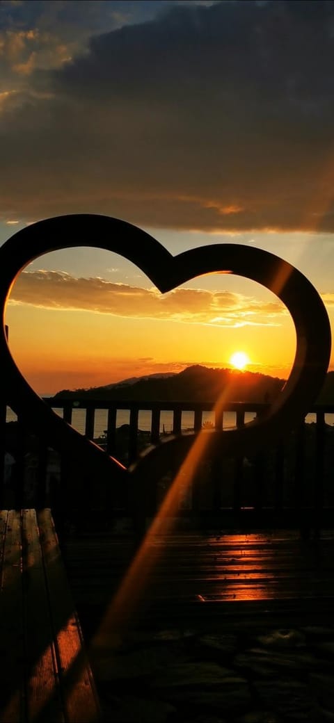 Restaurant/places to eat, Natural landscape, View (from property/room), Sea view, Sunset