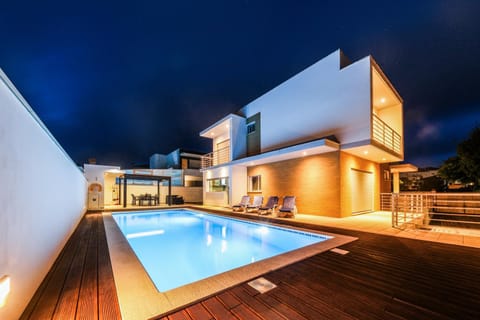 Property building, Off site, Night, Pool view, Swimming pool, sunbed