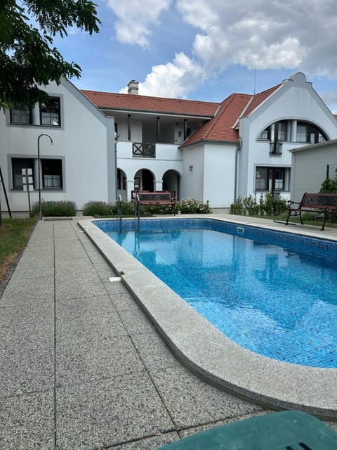 Property building, Pool view, Swimming pool, sunbed