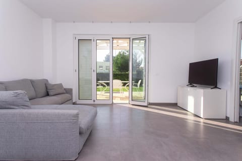 S018 - Sirolo, nuovissimo trilocale in pietra con giardino dx Apartment in Sirolo