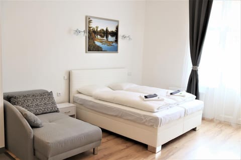 Bed, Seating area, Bedroom