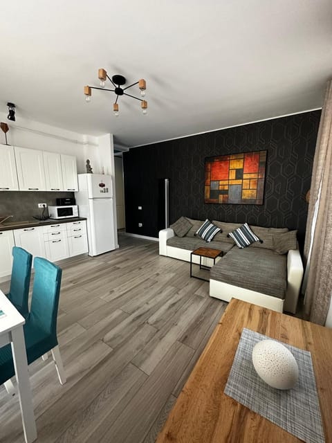 Kitchen or kitchenette, Living room, Seating area, Dining area