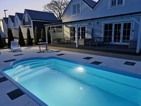 Property building, Pool view, Swimming pool, sunbed