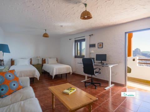 Bed, Living room, Seating area, Bedroom