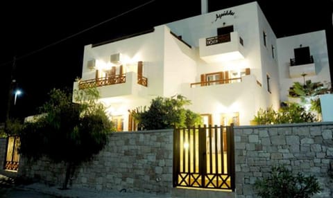 Property building, Facade/entrance, Off site, Night, Property logo or sign, Text overlay