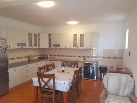 Kitchen or kitchenette, Seating area, Dining area, dishwasher, oven, stove