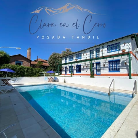 Property building, Day, Pool view, Swimming pool, sunbed