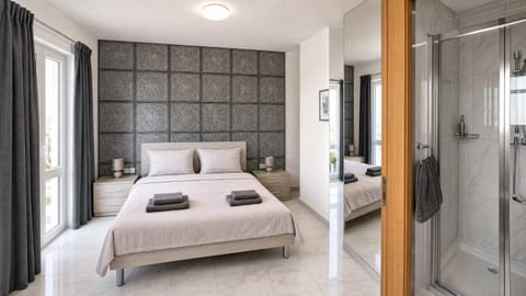 Bed, Bathroom, Photo of the whole room, Bedroom, towels, wardrobe, air conditioner