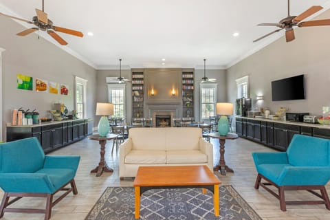 Property building, Lobby or reception, Seating area, fireplace