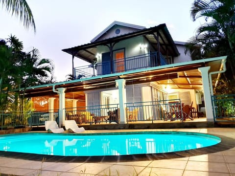 Property building, Patio, Pool view, Swimming pool, sunbed