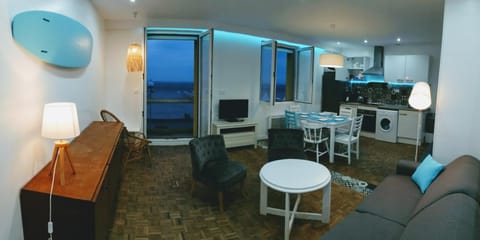 Living room, Decorative detail, Seating area, Dining area, Sea view, Sunset