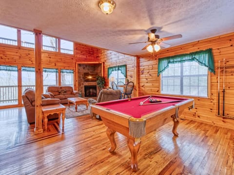 Billiard, Game Room, Living room, Seating area, fireplace, furniture