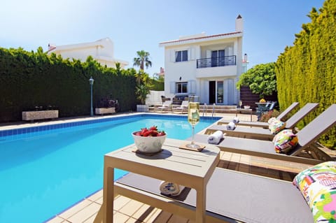 Property building, Patio, Pool view, Swimming pool, sunbed