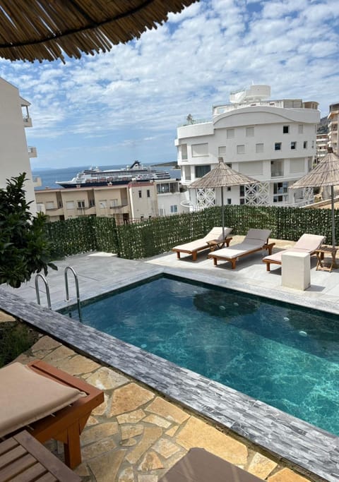 View (from property/room), Balcony/Terrace, Pool view, Sea view, Swimming pool