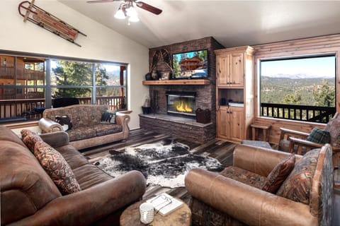 TV and multimedia, View (from property/room), Living room, Seating area, Mountain view, fireplace, furniture