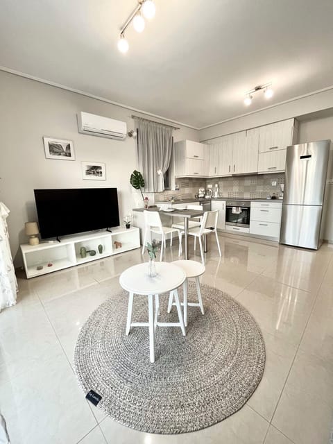 TV and multimedia, Kitchen or kitchenette, Living room, Seating area, Dining area, dishwasher, oven, stove, air conditioner