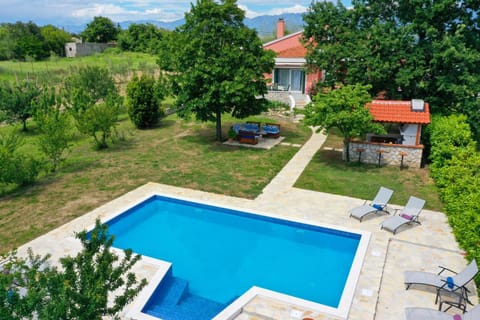Patio, BBQ facilities, Garden, Seating area, Pool view, Swimming pool, Swimming pool