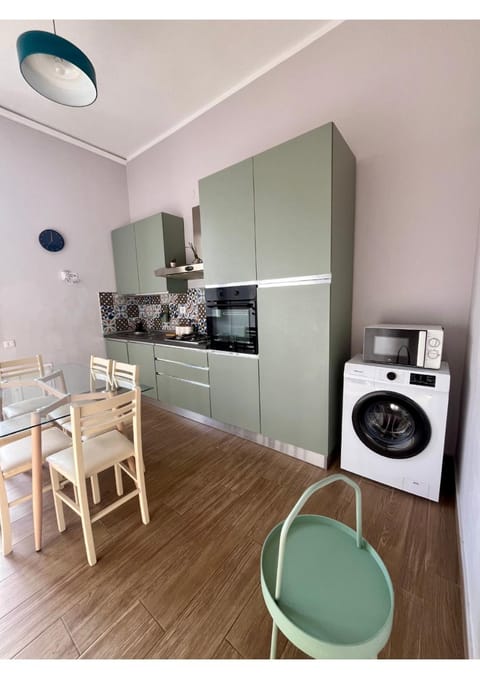 Kitchen or kitchenette, washing machine