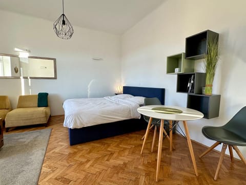 Bed, Living room, Seating area