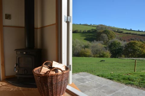 Snug Oak Hut with a view on a Welsh Hill Farm Apartment in Wales