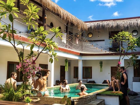 Property building, Patio, Pool view, Swimming pool, group of guests