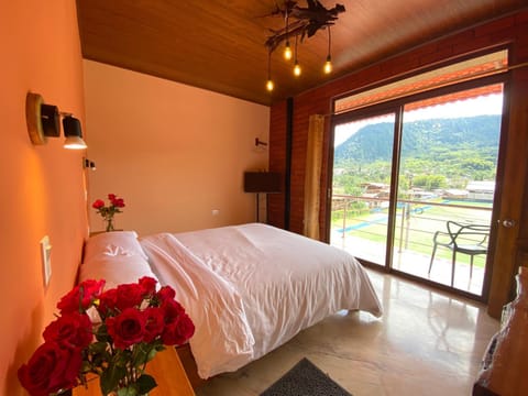 Bed, View (from property/room), Balcony/Terrace, Decorative detail, Garden view