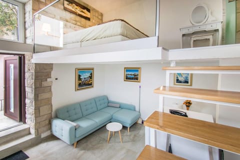 Bed, Living room, Seating area