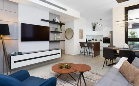 TV and multimedia, Living room, Photo of the whole room, Seating area, Dining area