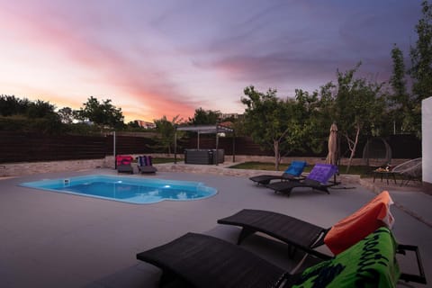 Patio, Day, Natural landscape, Pool view, Swimming pool, Sunrise, Sunset, sunbed