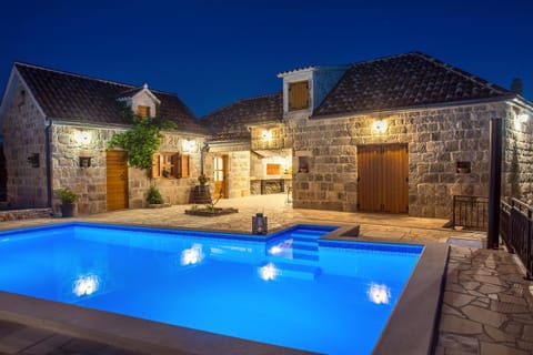 Property building, Patio, Night, Pool view, Swimming pool, sunbed