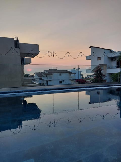 Property building, Swimming pool, Sunrise, Sunset