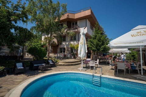 Property building, Restaurant/places to eat, Garden, Swimming pool