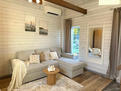 Bed, Living room, Seating area, Garden view, Street view, furniture, air conditioner