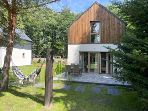 DOMKI Sosnowy Holiday Park Campground/ 
RV Resort in Pomeranian Voivodeship