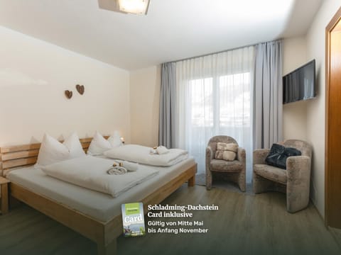 Bed, Seating area, Bedroom, towels