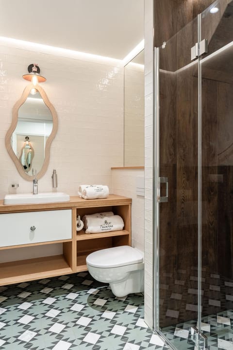 Shower, Toilet, Bathroom, hair dryier, towels