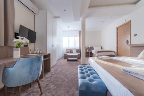 Bed, Seating area, Text overlay