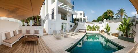Patio, Seating area, Pool view, Swimming pool, sunbed