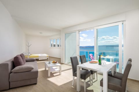 Living room, Seating area, Dining area, Sea view