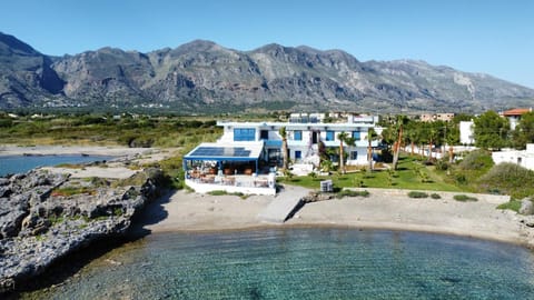 Property building, Nearby landmark, Natural landscape, Bird's eye view, Beach, Mountain view, Sea view