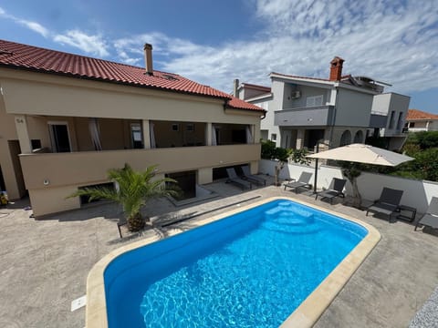 Property building, Patio, Pool view, Swimming pool