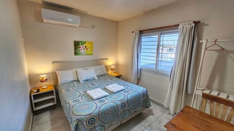 Bed, Photo of the whole room, Bedroom, towels, air conditioner