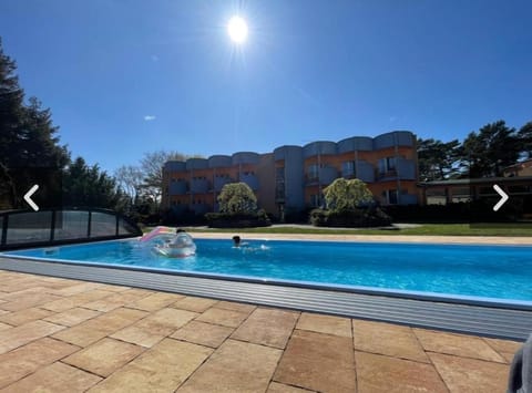 Property building, Pool view, Swimming pool, sunbed