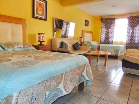 Bed, Living room, Seating area, Bedroom